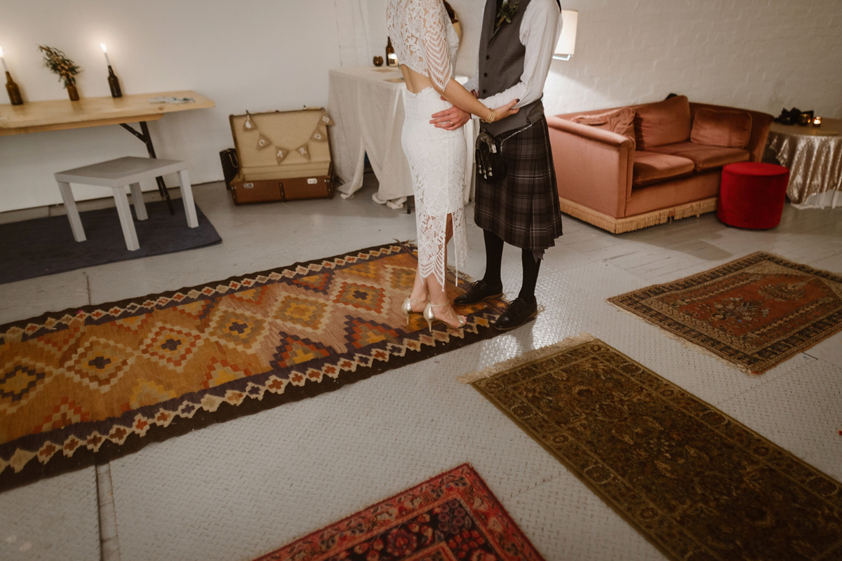 Katie wore a For Love & Lemons dress for her cool, modern, warehouse wedding in Glasgow. Photography by The Curries.