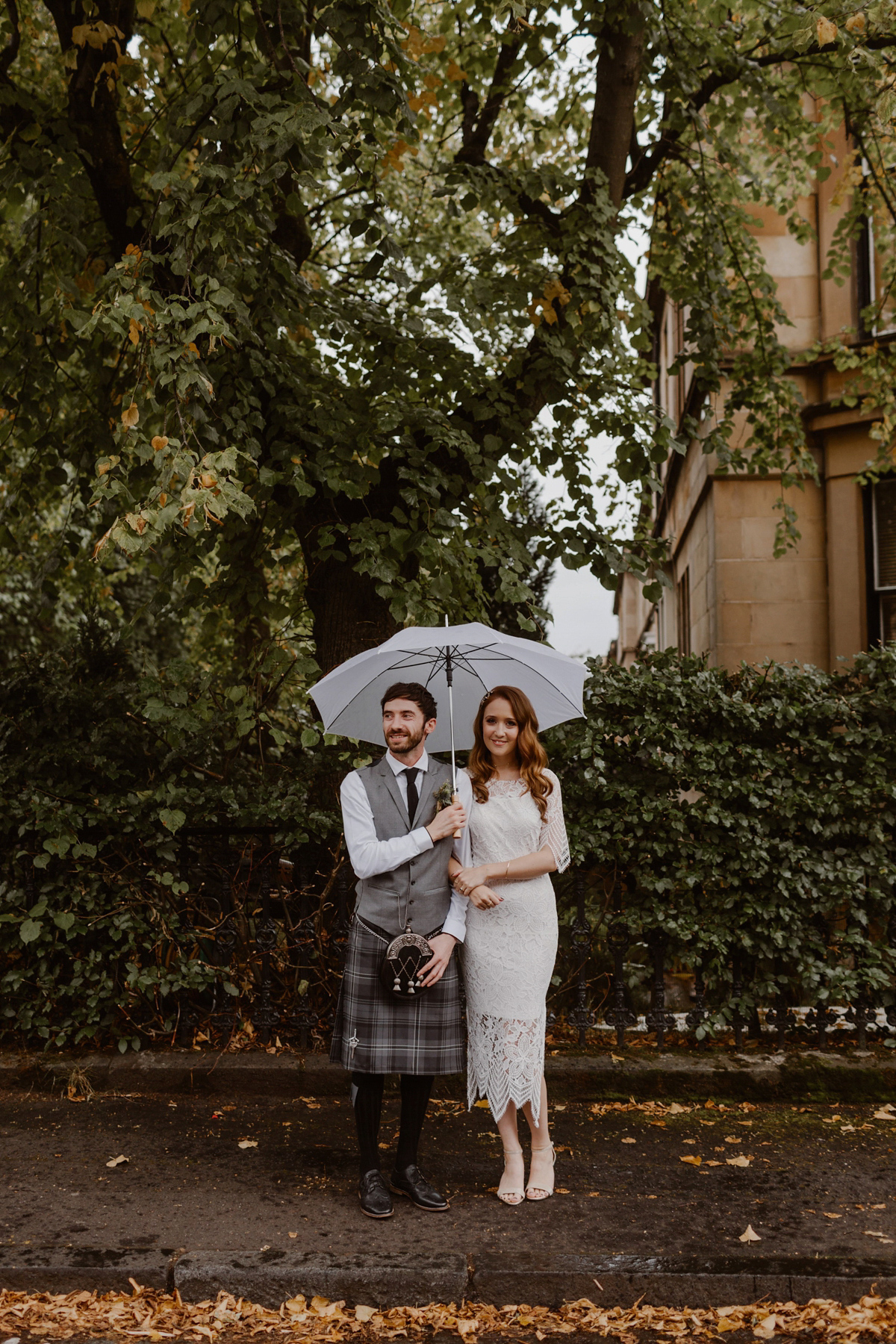 Katie wore a For Love & Lemons dress for her cool, modern, warehouse wedding in Glasgow. Photography by The Curries.