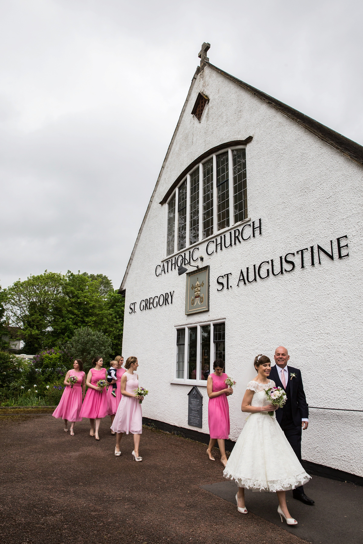 Jo wore a retro inspired Sassi Holford gown from Ellie Sanderson bridal boutique and a pair of Charlotte Mills shoes for her 'silent disco' wedding. Photography by Hannah Larkin.