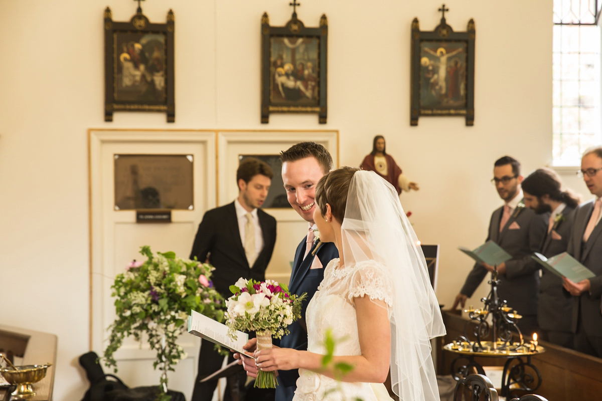 Jo wore a retro inspired Sassi Holford gown from Ellie Sanderson bridal boutique and a pair of Charlotte Mills shoes for her 'silent disco' wedding. Photography by Hannah Larkin.