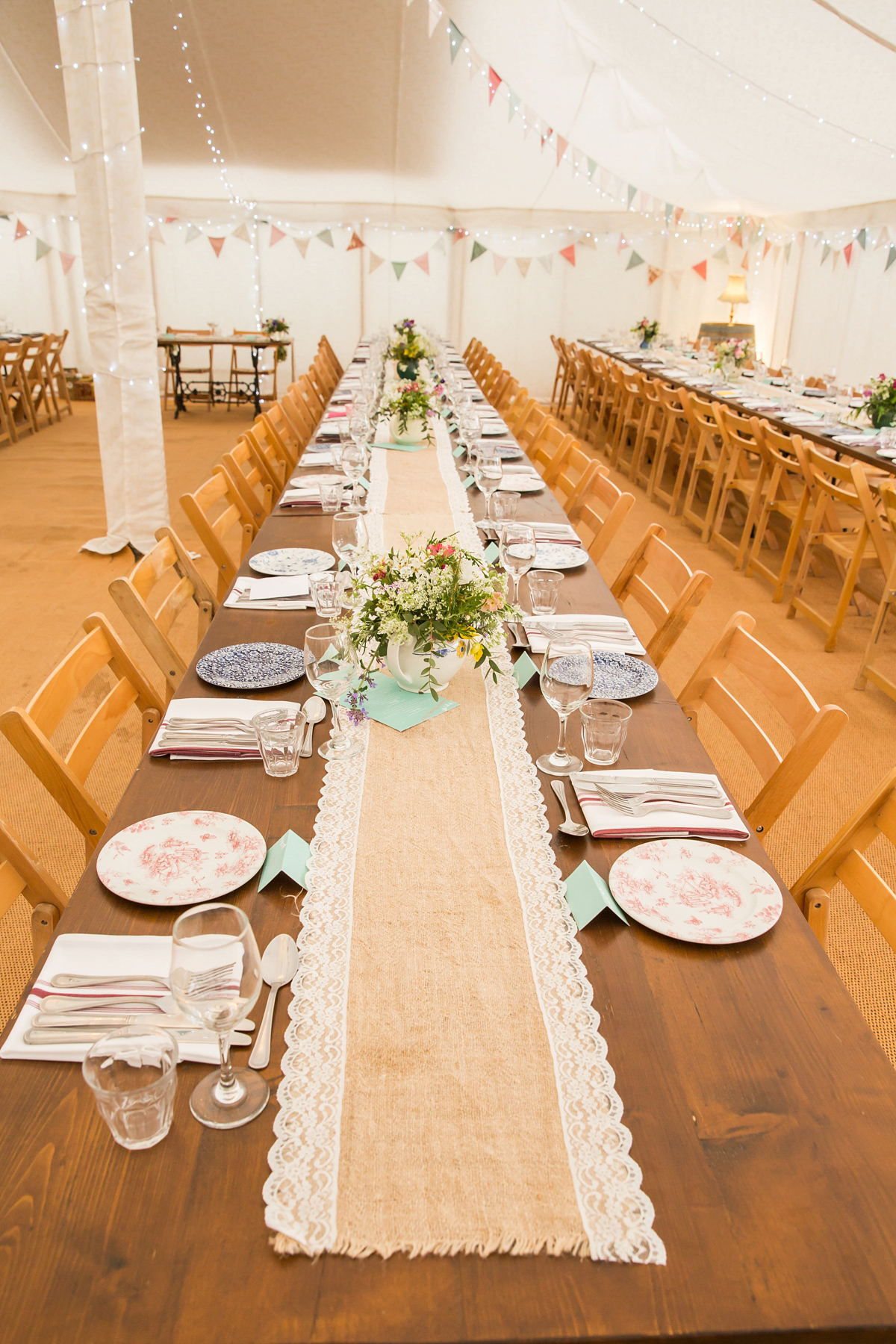 Jo wore a retro inspired Sassi Holford gown from Ellie Sanderson bridal boutique and a pair of Charlotte Mills shoes for her 'silent disco' wedding. Photography by Hannah Larkin.