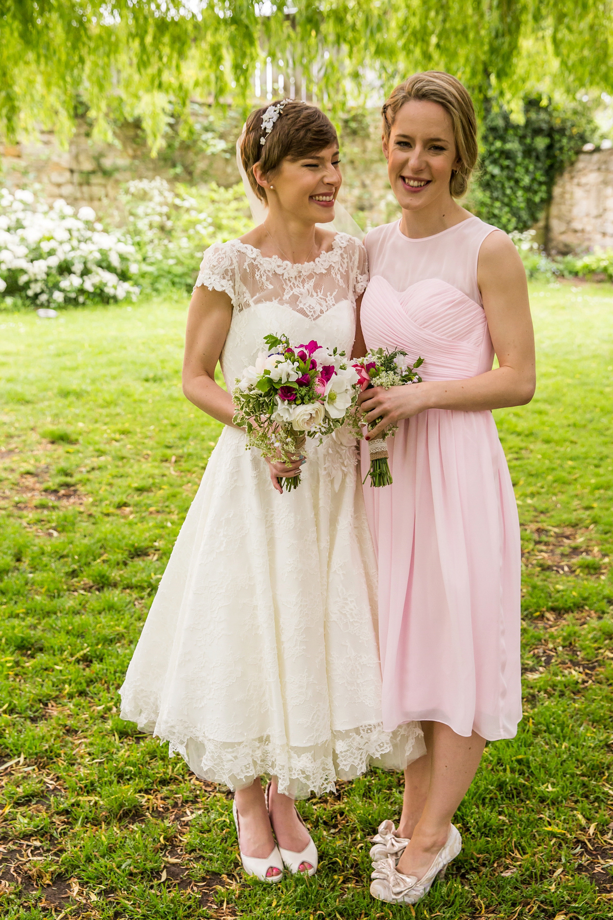 Jo wore a retro inspired Sassi Holford gown from Ellie Sanderson bridal boutique and a pair of Charlotte Mills shoes for her 'silent disco' wedding. Photography by Hannah Larkin.