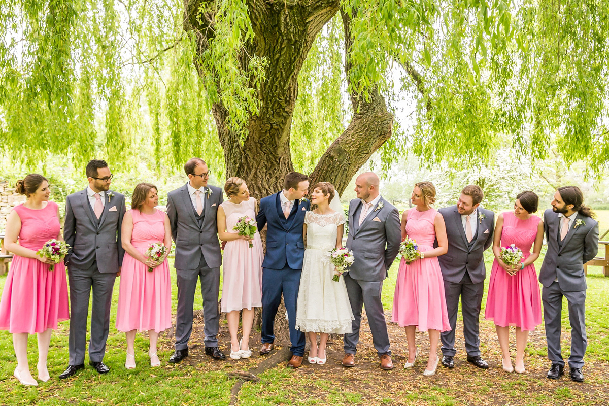 Jo wore a retro inspired Sassi Holford gown from Ellie Sanderson bridal boutique and a pair of Charlotte Mills shoes for her 'silent disco' wedding. Photography by Hannah Larkin.