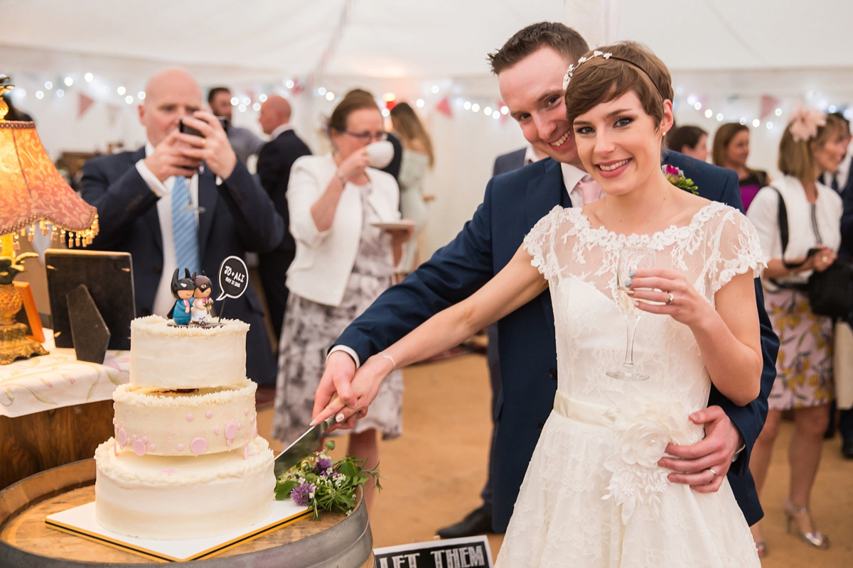 Jo wore a retro inspired Sassi Holford gown from Ellie Sanderson bridal boutique and a pair of Charlotte Mills shoes for her 'silent disco' wedding. Photography by Hannah Larkin.