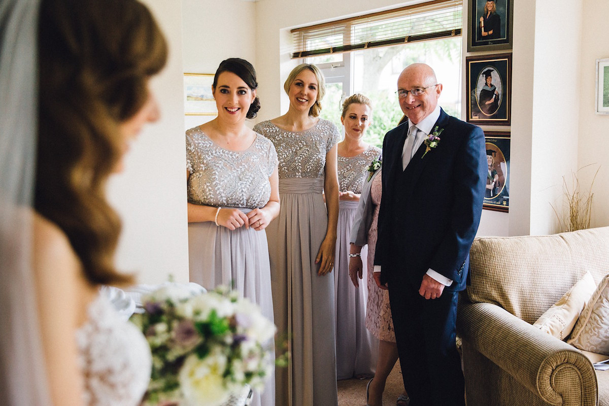 Caroline wore a Martina Liana gown for her elegant rainy day barn wedding. Images captured by Red On Blonde Photography.