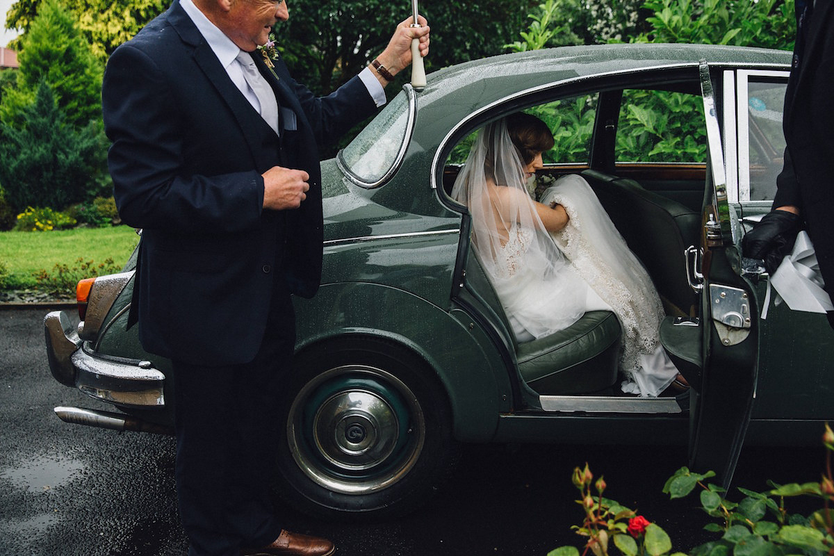 Caroline wore a Martina Liana gown for her elegant rainy day barn wedding. Images captured by Red On Blonde Photography.