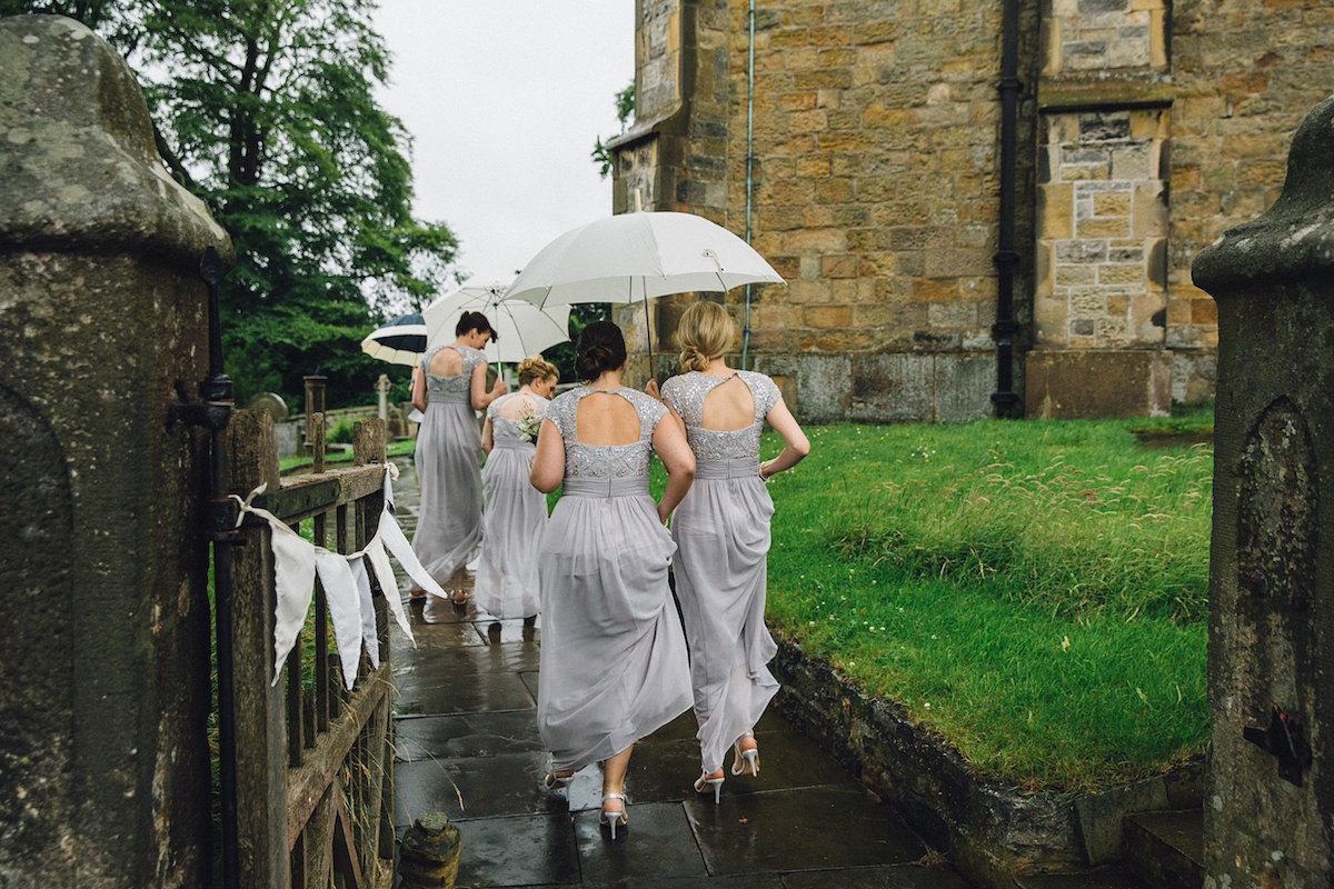 Caroline wore a Martina Liana gown for her elegant rainy day barn wedding. Images captured by Red On Blonde Photography.