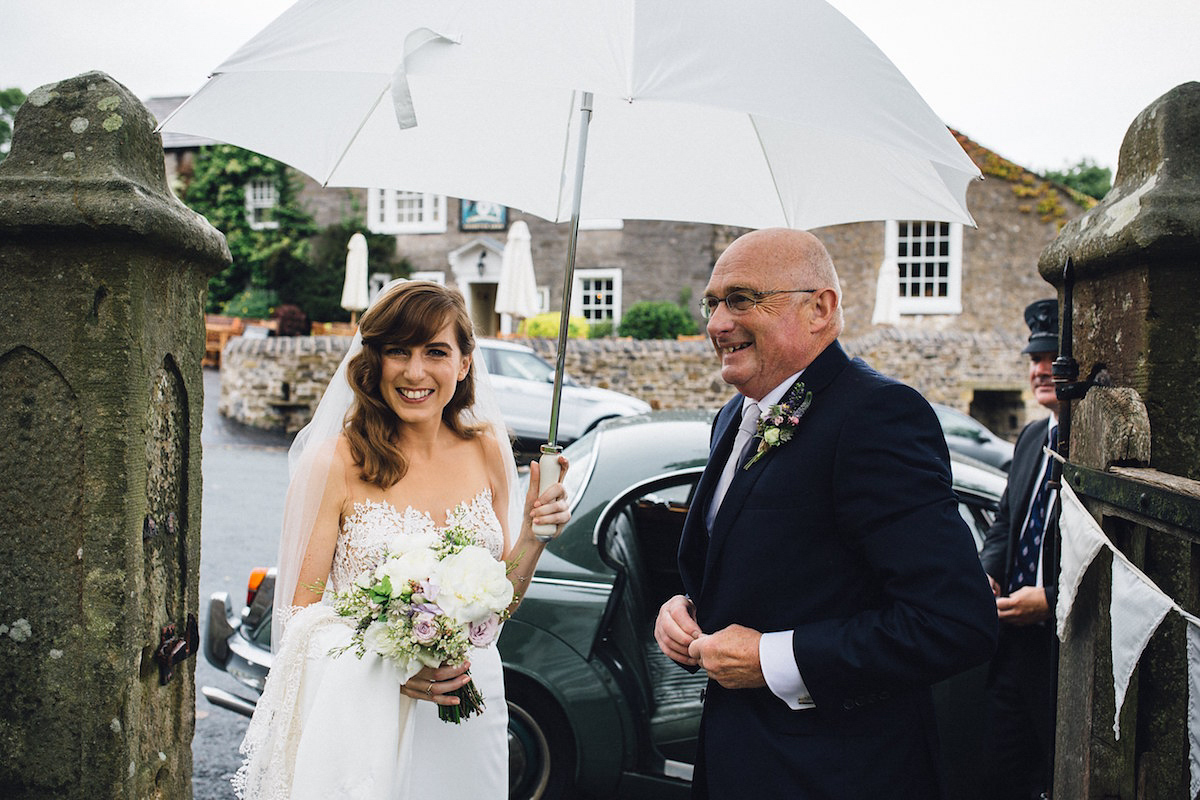 Caroline wore a Martina Liana gown for her elegant rainy day barn wedding. Images captured by Red On Blonde Photography.