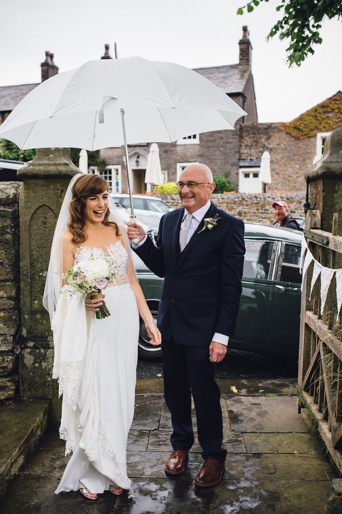 Caroline wore a Martina Liana gown for her elegant rainy day barn wedding. Images captured by Red On Blonde Photography.