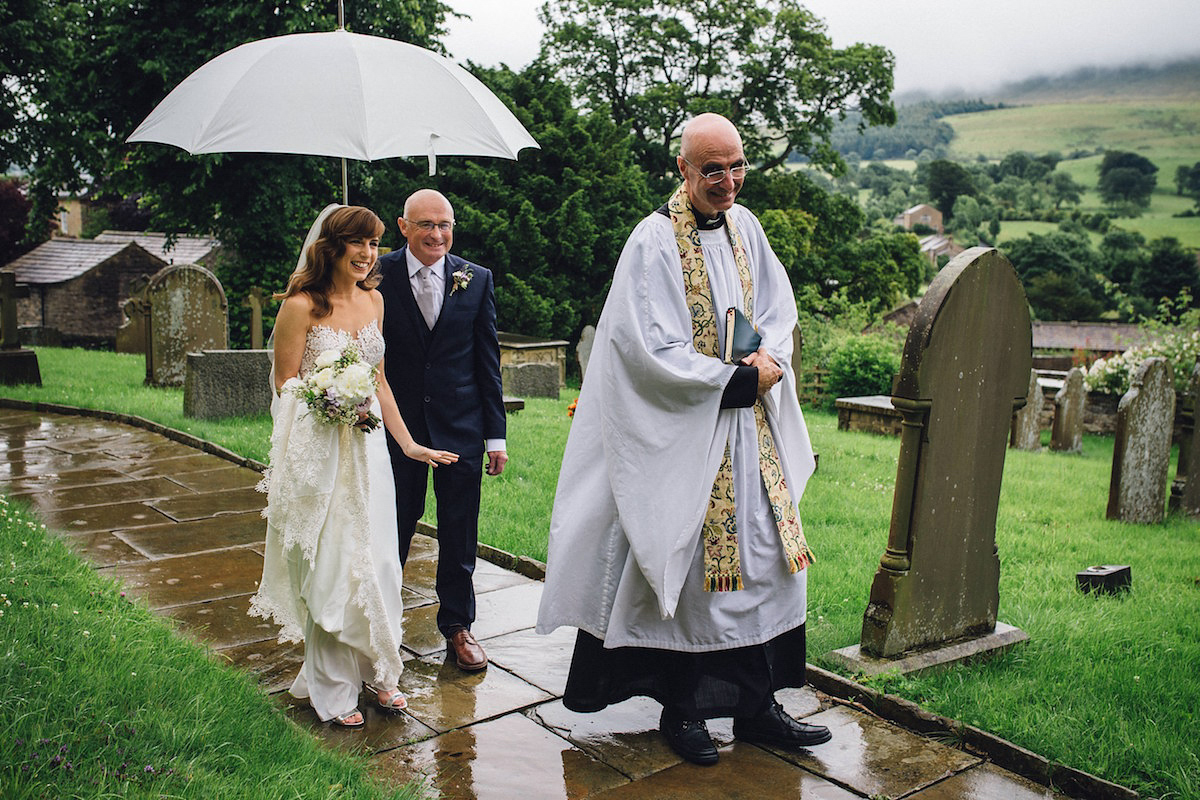 Caroline wore a Martina Liana gown for her elegant rainy day barn wedding. Images captured by Red On Blonde Photography.