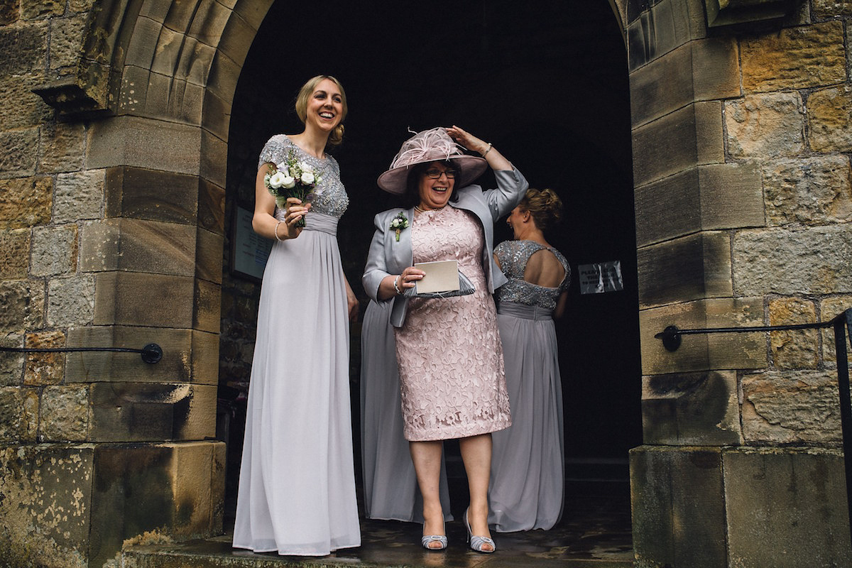 Caroline wore a Martina Liana gown for her elegant rainy day barn wedding. Images captured by Red On Blonde Photography.