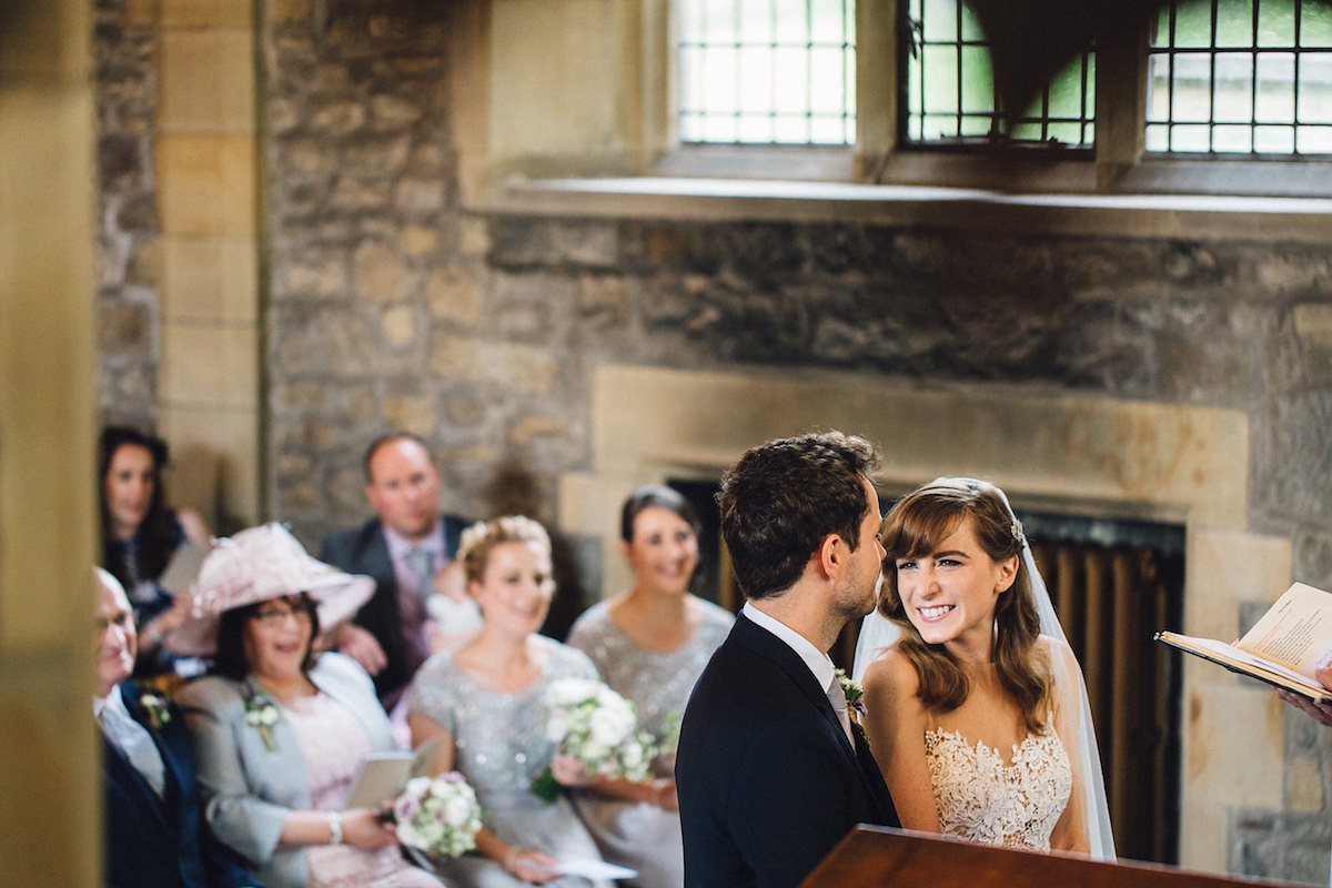 Caroline wore a Martina Liana gown for her elegant rainy day barn wedding. Images captured by Red On Blonde Photography.