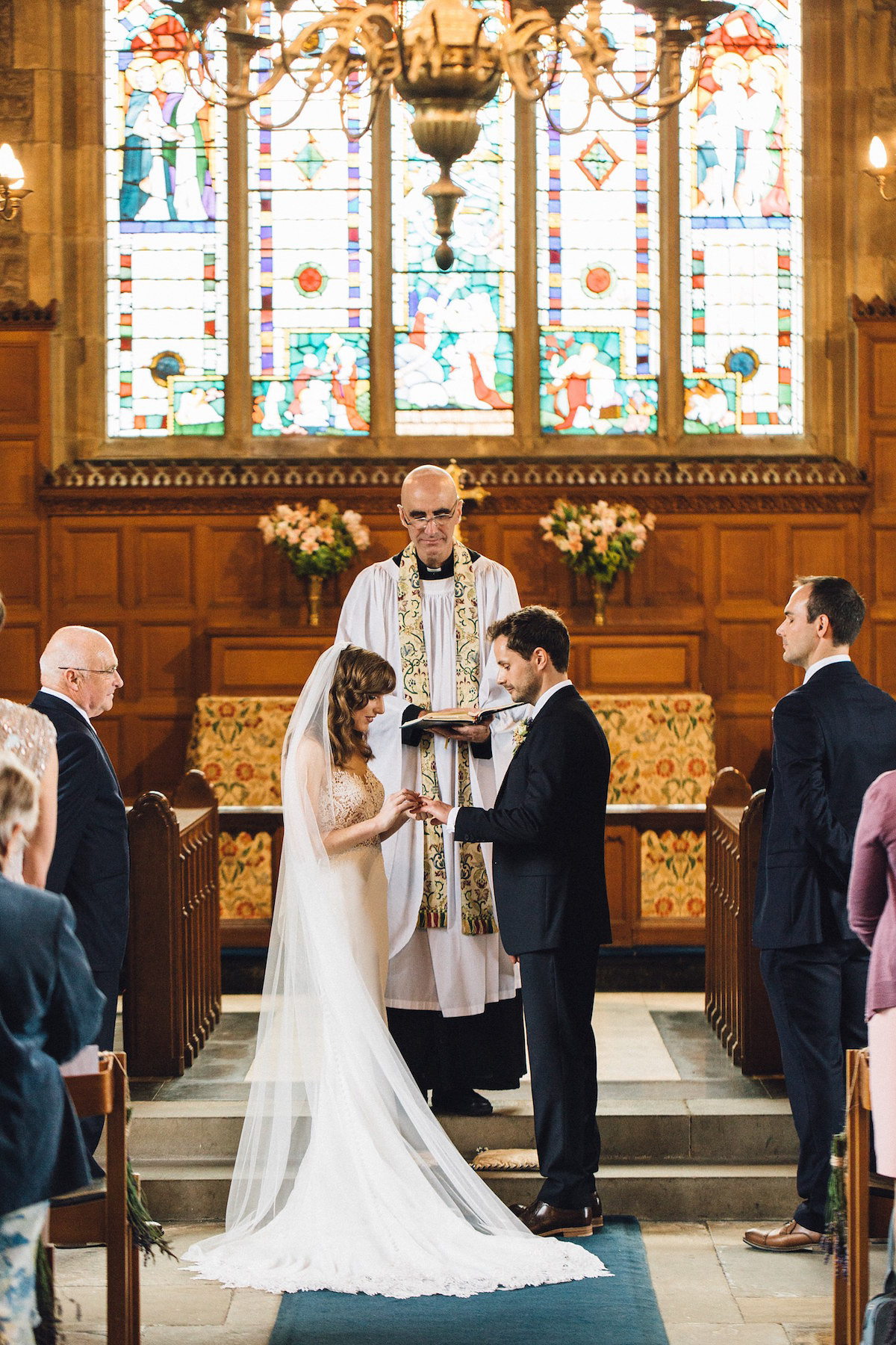 Caroline wore a Martina Liana gown for her elegant rainy day barn wedding. Images captured by Red On Blonde Photography.