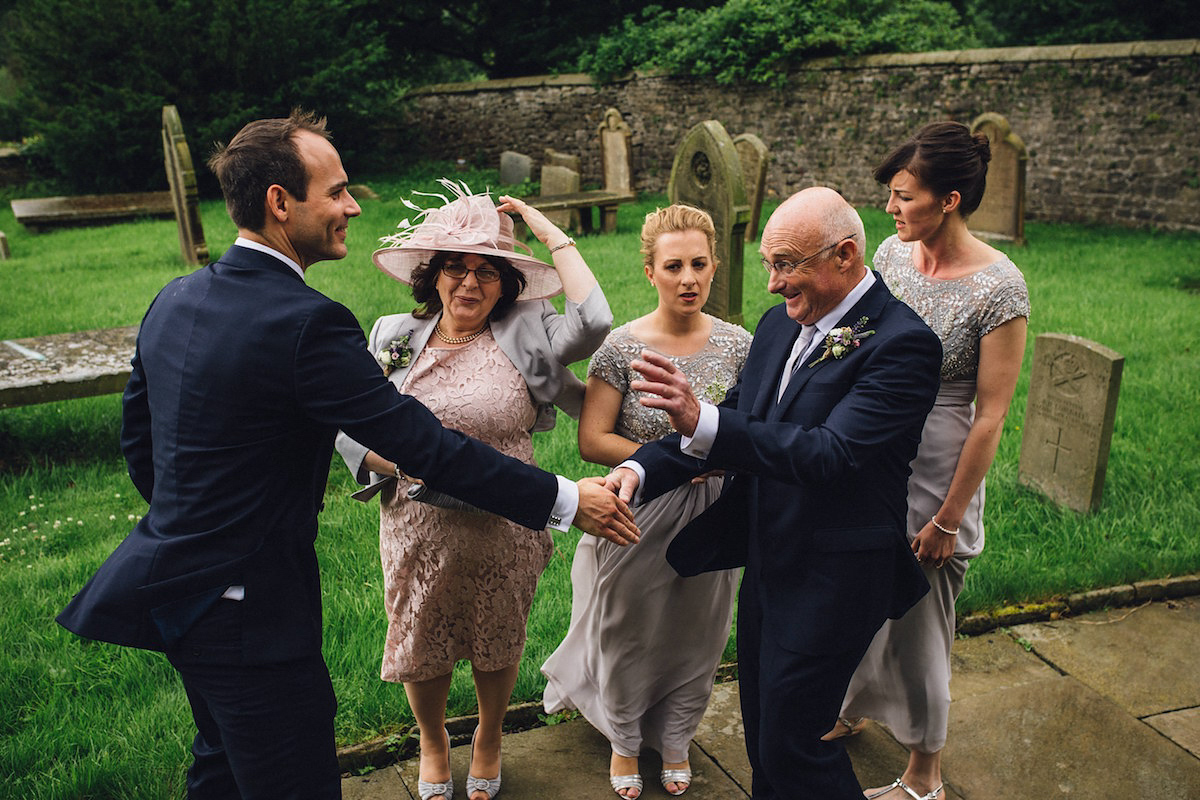 Caroline wore a Martina Liana gown for her elegant rainy day barn wedding. Images captured by Red On Blonde Photography.