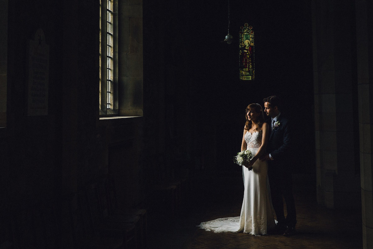 Caroline wore a Martina Liana gown for her elegant rainy day barn wedding. Images captured by Red On Blonde Photography.