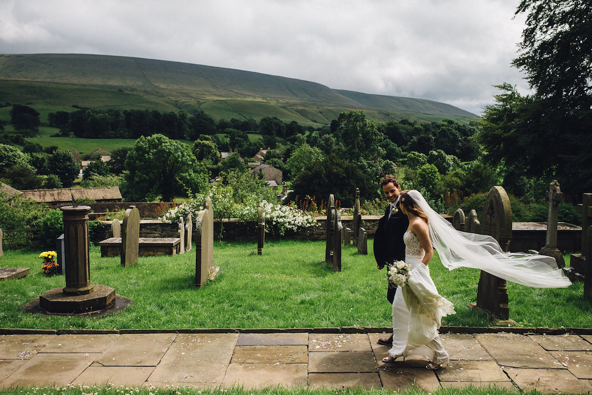 Caroline wore a Martina Liana gown for her elegant rainy day barn wedding. Images captured by Red On Blonde Photography.