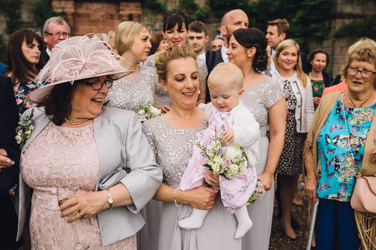 Caroline wore a Martina Liana gown for her elegant rainy day barn wedding. Images captured by Red On Blonde Photography.