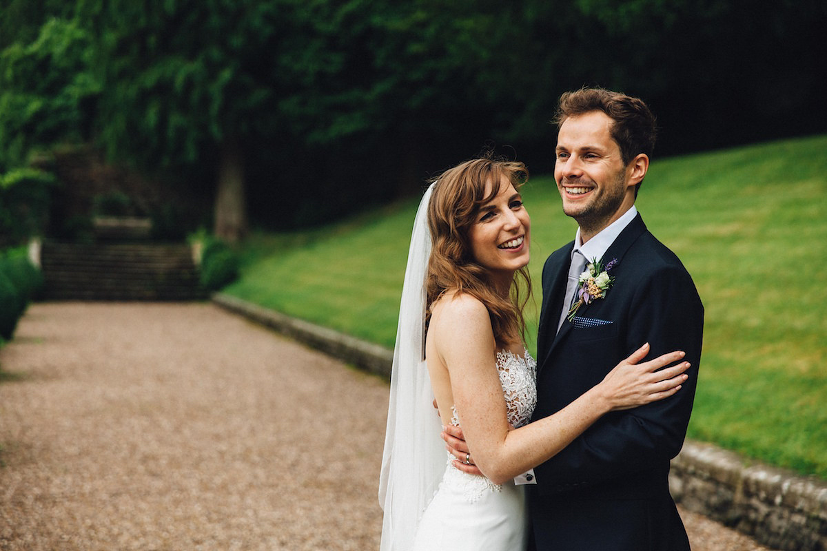 Caroline wore a Martina Liana gown for her elegant rainy day barn wedding. Images captured by Red On Blonde Photography.