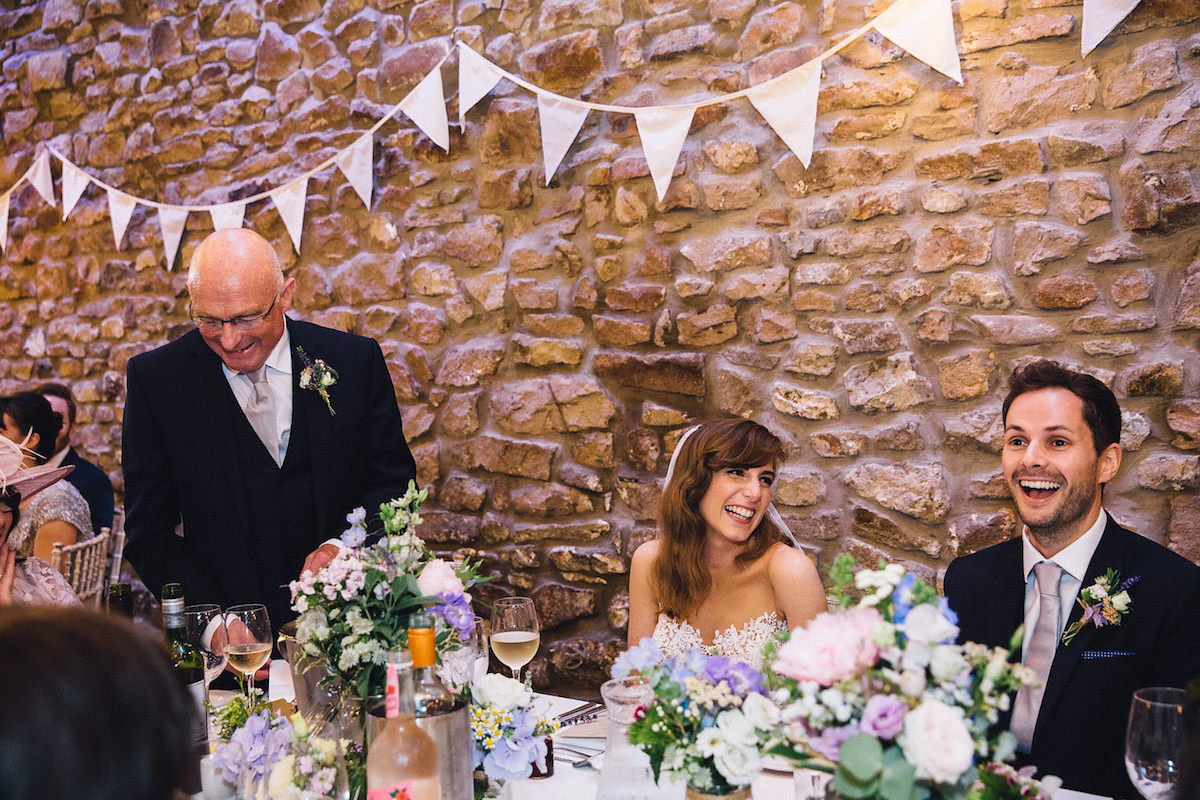 Caroline wore a Martina Liana gown for her elegant rainy day barn wedding. Images captured by Red On Blonde Photography.