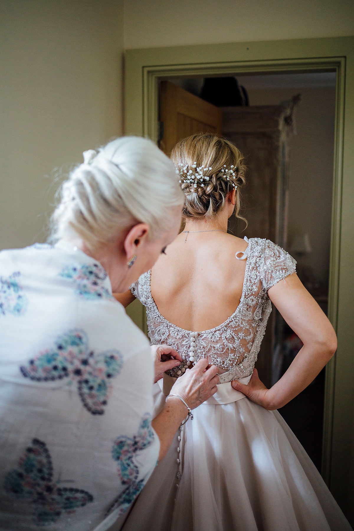 Laurie wore a blush pink tulle gown by Allure Bridals for her English country, vintage inspired wedding. Photography by Rachael Fraser.