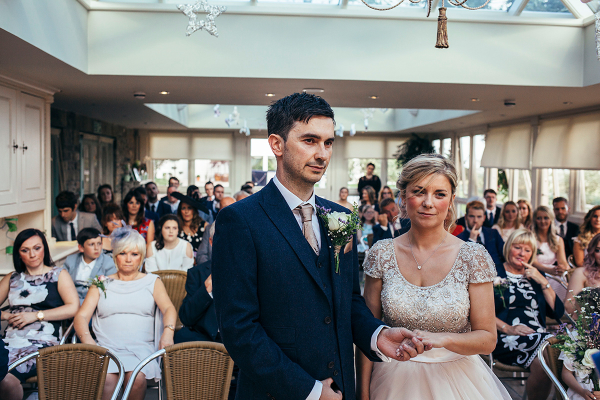 Laurie wore a blush pink tulle gown by Allure Bridals for her English country, vintage inspired wedding. Photography by Rachael Fraser.