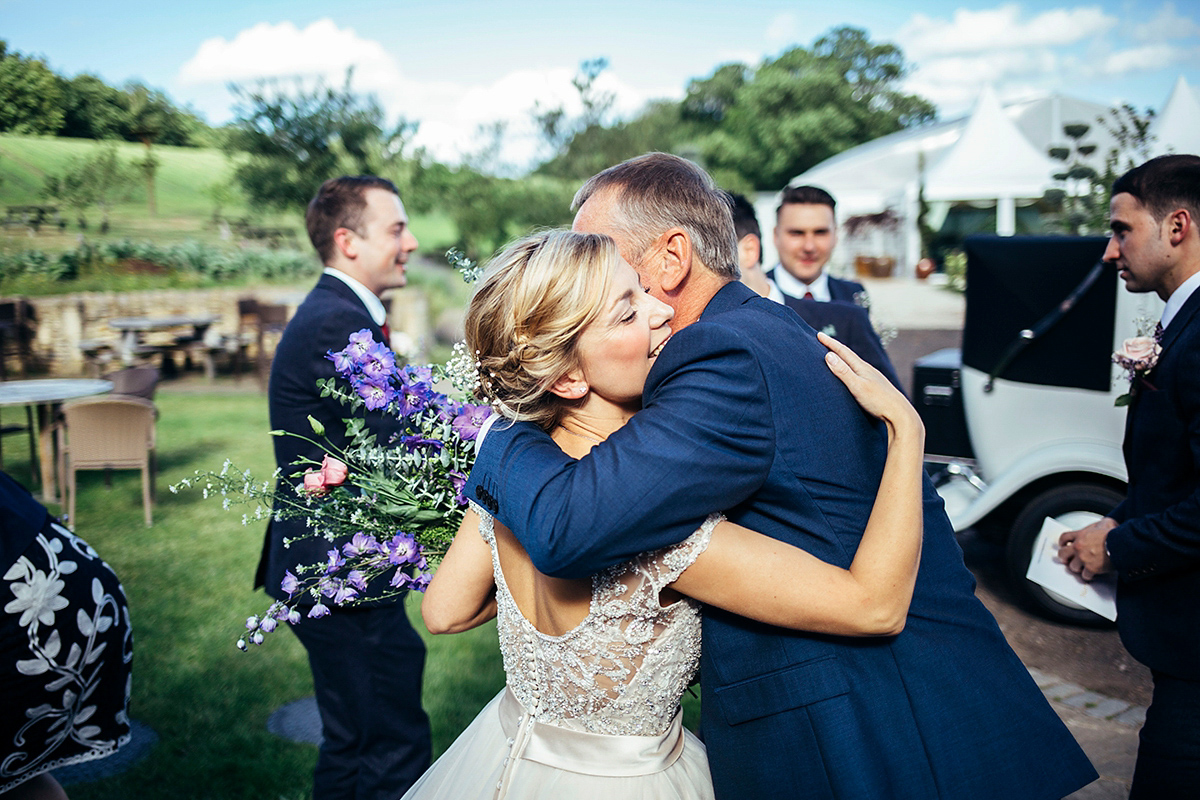 Laurie wore a blush pink tulle gown by Allure Bridals for her English country, vintage inspired wedding. Photography by Rachael Fraser.