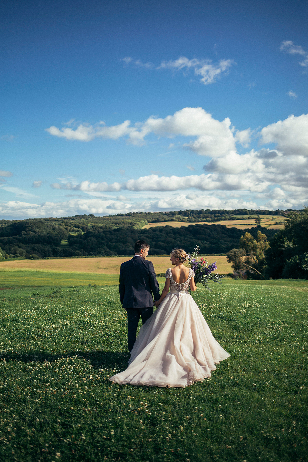 Laurie wore a blush pink tulle gown by Allure Bridals for her English country, vintage inspired wedding. Photography by Rachael Fraser.