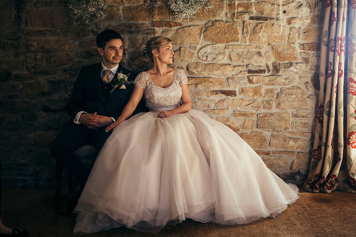 Laurie wore a blush pink tulle gown by Allure Bridals for her English country, vintage inspired wedding. Photography by Rachael Fraser.