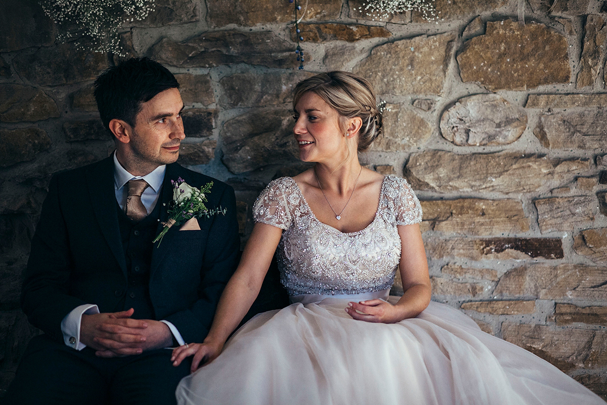 Laurie wore a blush pink tulle gown by Allure Bridals for her English country, vintage inspired wedding. Photography by Rachael Fraser.