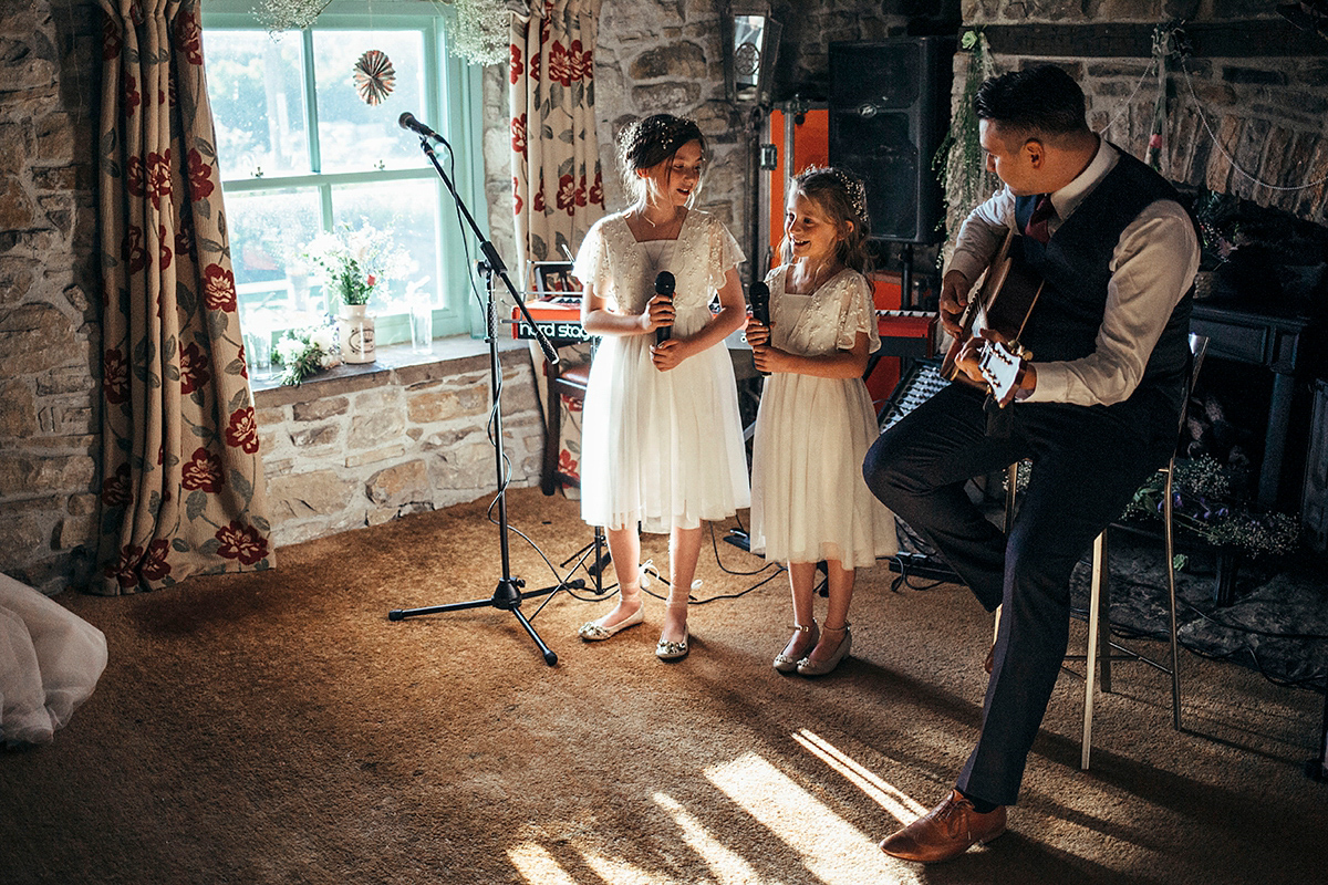 Laurie wore a blush pink tulle gown by Allure Bridals for her English country, vintage inspired wedding. Photography by Rachael Fraser.