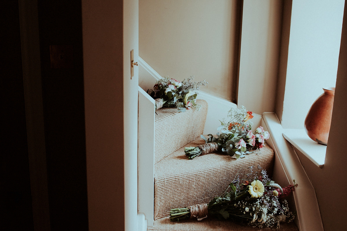 The bride wore an Essense of Australia gown for her colourful and homespun Summer wedding. Photography by Shutter Go Click.