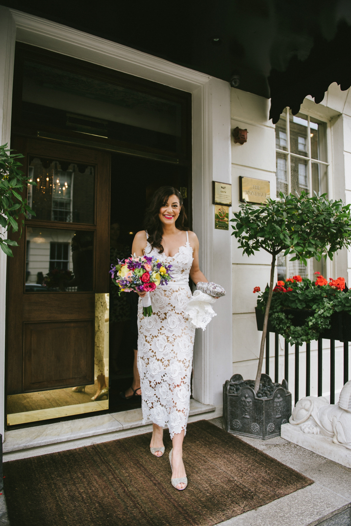 Theresa wore the Frida gown by Catherine Deane, via BHLDN, for her modern London wedding with no bridesmaids. Photography by Ed Godden.