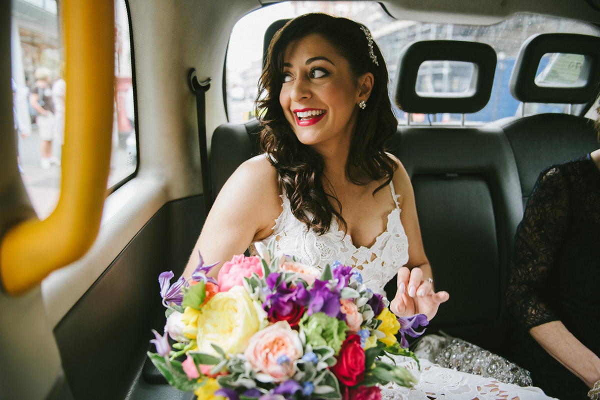 Theresa wore the Frida gown by Catherine Deane, via BHLDN, for her modern London wedding with no bridesmaids. Photography by Ed Godden.