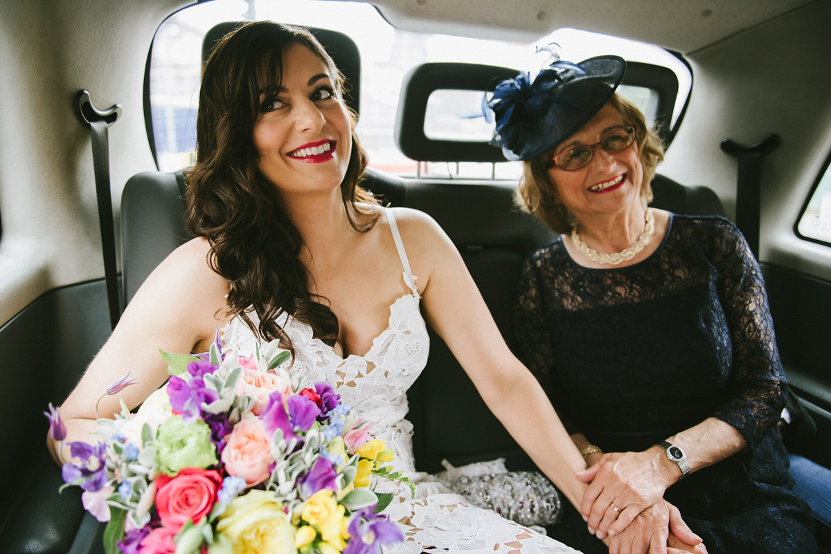 Theresa wore the Frida gown by Catherine Deane, via BHLDN, for her modern London wedding with no bridesmaids. Photography by Ed Godden.