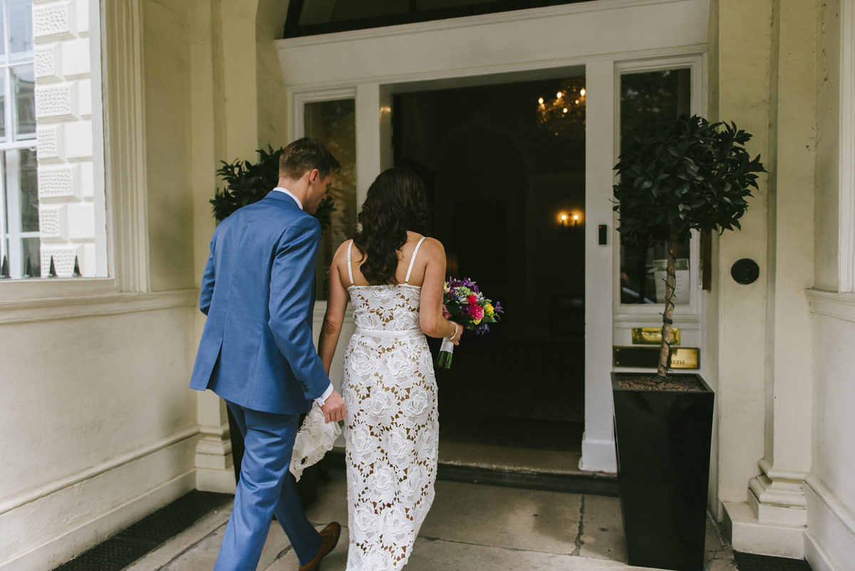 Theresa wore the Frida gown by Catherine Deane, via BHLDN, for her modern London wedding with no bridesmaids. Photography by Ed Godden.