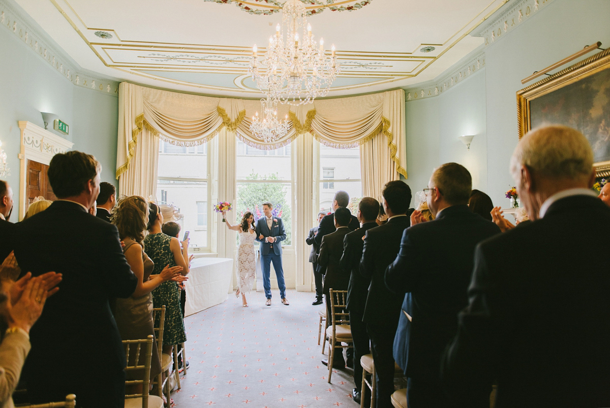 Theresa wore the Frida gown by Catherine Deane, via BHLDN, for her modern London wedding with no bridesmaids. Photography by Ed Godden.