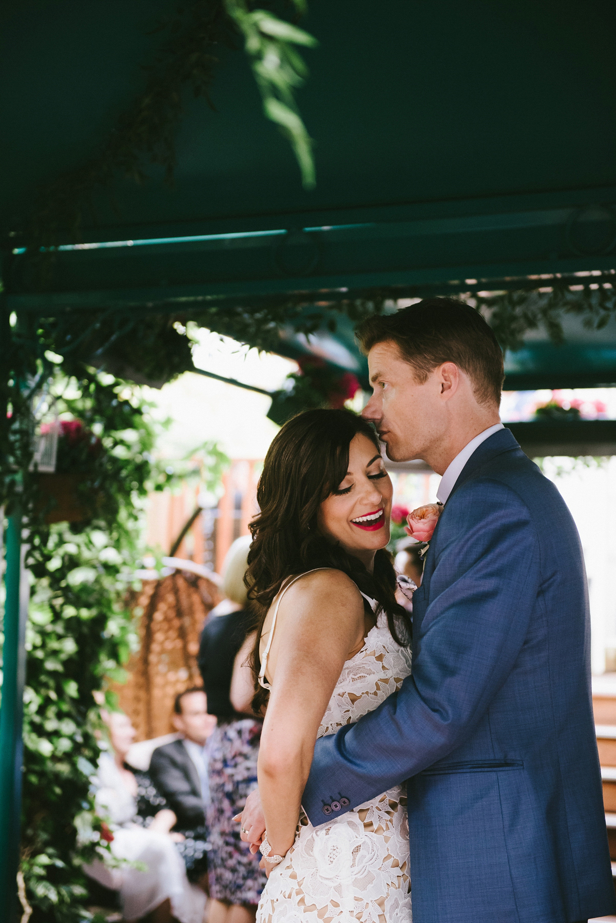 Theresa wore the Frida gown by Catherine Deane, via BHLDN, for her modern London wedding with no bridesmaids. Photography by Ed Godden.