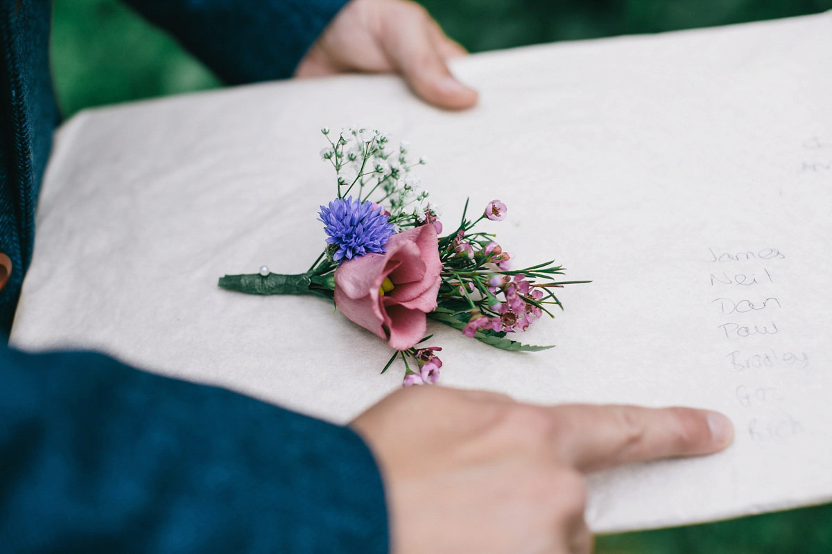 Sarah wore a 1950's inspired tea length wedding dress for her woodland wedding in Scotland. Images captured by Mirrorbox Photography.