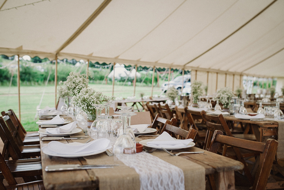 Posie wore a Delphine Manivet gown for her rustic, handmade, outdoor handfasting ceremony, captured by Amy Taylor Imaging.