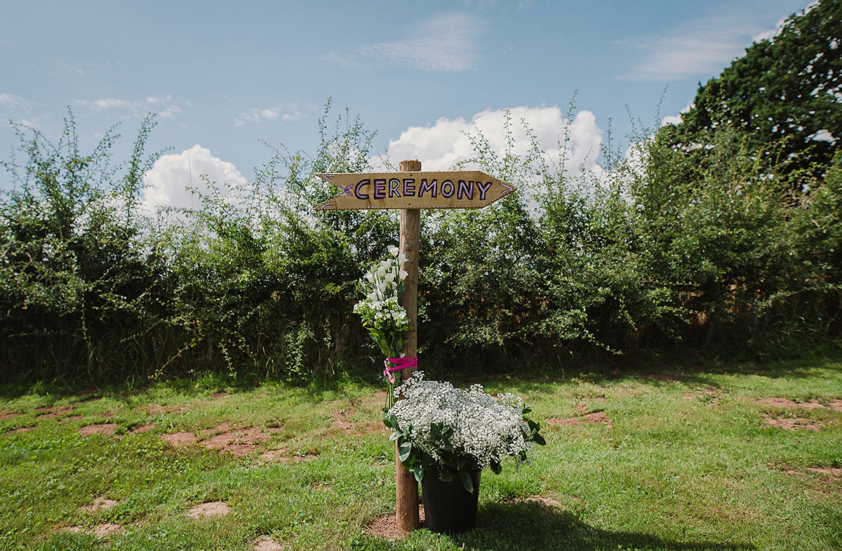 Posie wore a Delphine Manivet gown for her rustic, handmade, outdoor handfasting ceremony, captured by Amy Taylor Imaging.