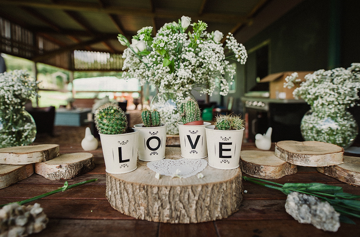 Posie wore a Delphine Manivet gown for her rustic, handmade, outdoor handfasting ceremony, captured by Amy Taylor Imaging.