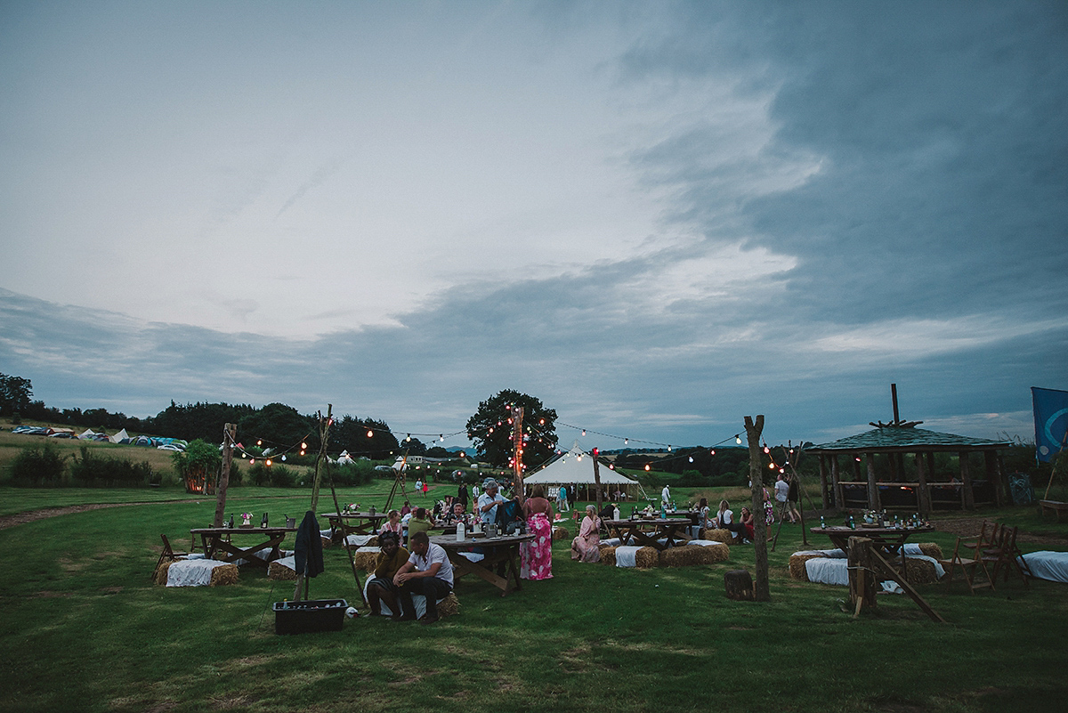 Posie wore a Delphine Manivet gown for her rustic, handmade, outdoor handfasting ceremony, captured by Amy Taylor Imaging.