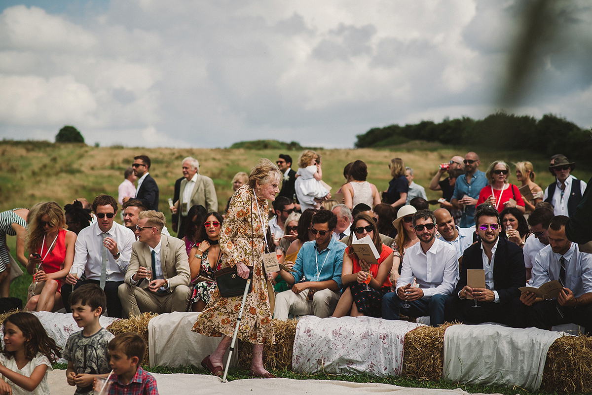 Posie wore a Delphine Manivet gown for her rustic, handmade, outdoor handfasting ceremony, captured by Amy Taylor Imaging.