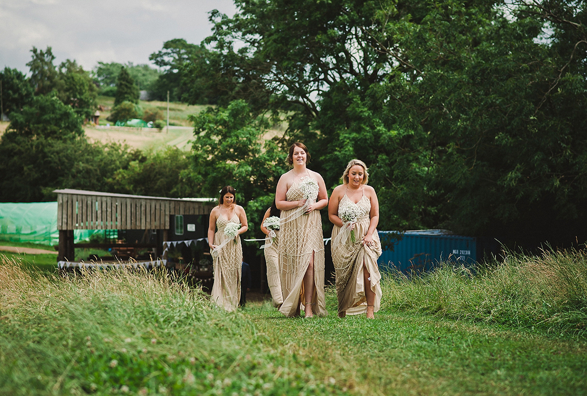 Posie wore a Delphine Manivet gown for her rustic, handmade, outdoor handfasting ceremony, captured by Amy Taylor Imaging.