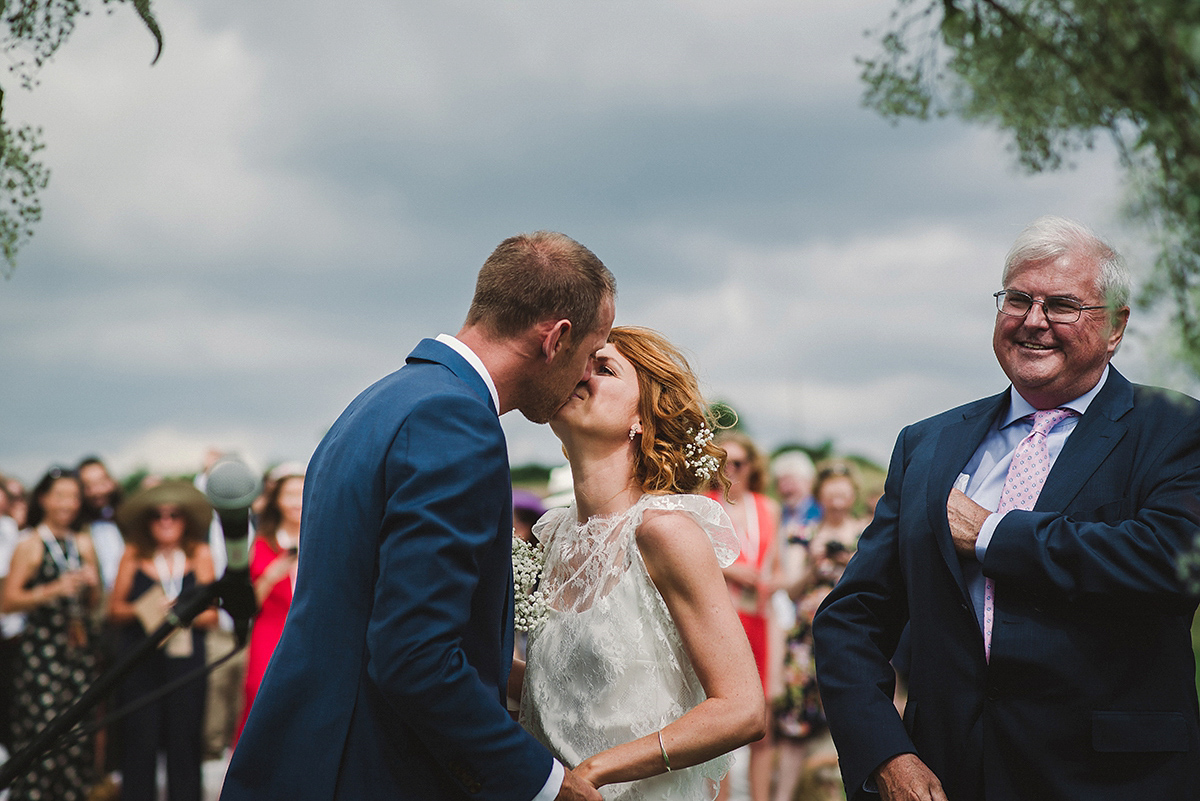 Posie wore a Delphine Manivet gown for her rustic, handmade, outdoor handfasting ceremony, captured by Amy Taylor Imaging.