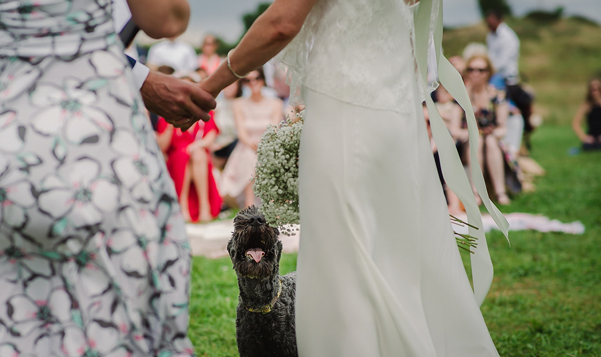 Posie wore a Delphine Manivet gown for her rustic, handmade, outdoor handfasting ceremony, captured by Amy Taylor Imaging.