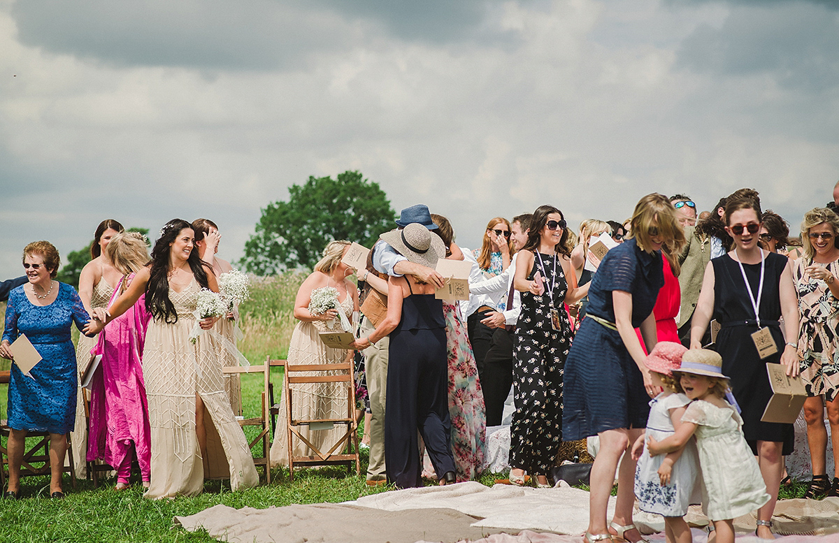 Posie wore a Delphine Manivet gown for her rustic, handmade, outdoor handfasting ceremony, captured by Amy Taylor Imaging.