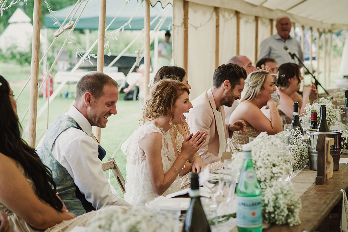 Posie wore a Delphine Manivet gown for her rustic, handmade, outdoor handfasting ceremony, captured by Amy Taylor Imaging.