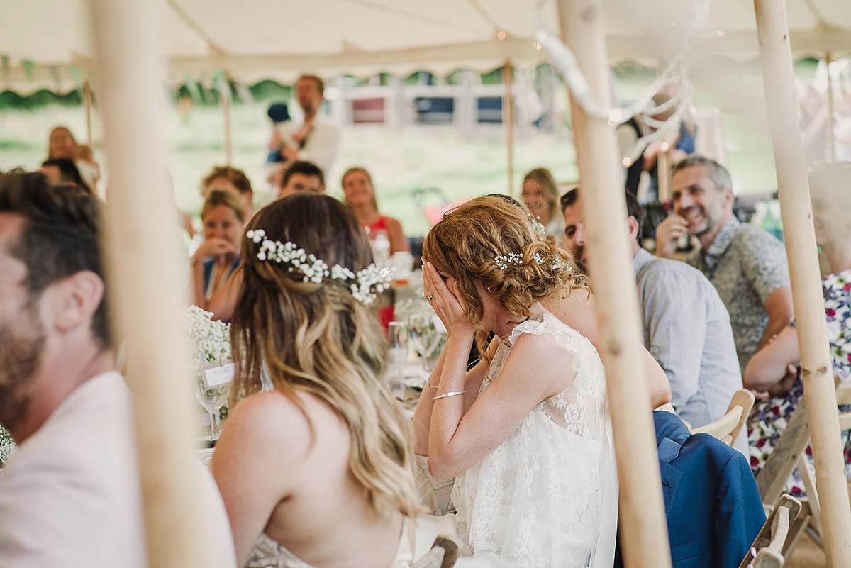 Posie wore a Delphine Manivet gown for her rustic, handmade, outdoor handfasting ceremony, captured by Amy Taylor Imaging.