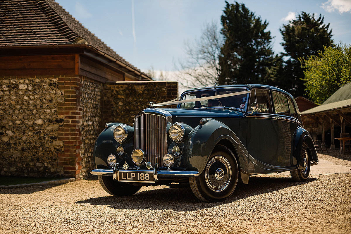 Michelle wore a chic, beaded, Jenny Packham gown for her elegant Sussex barn wedding. Photography by Paul Joseph.